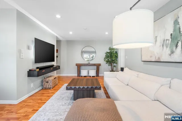 a view of living room with granite countertop furniture and fireplace
