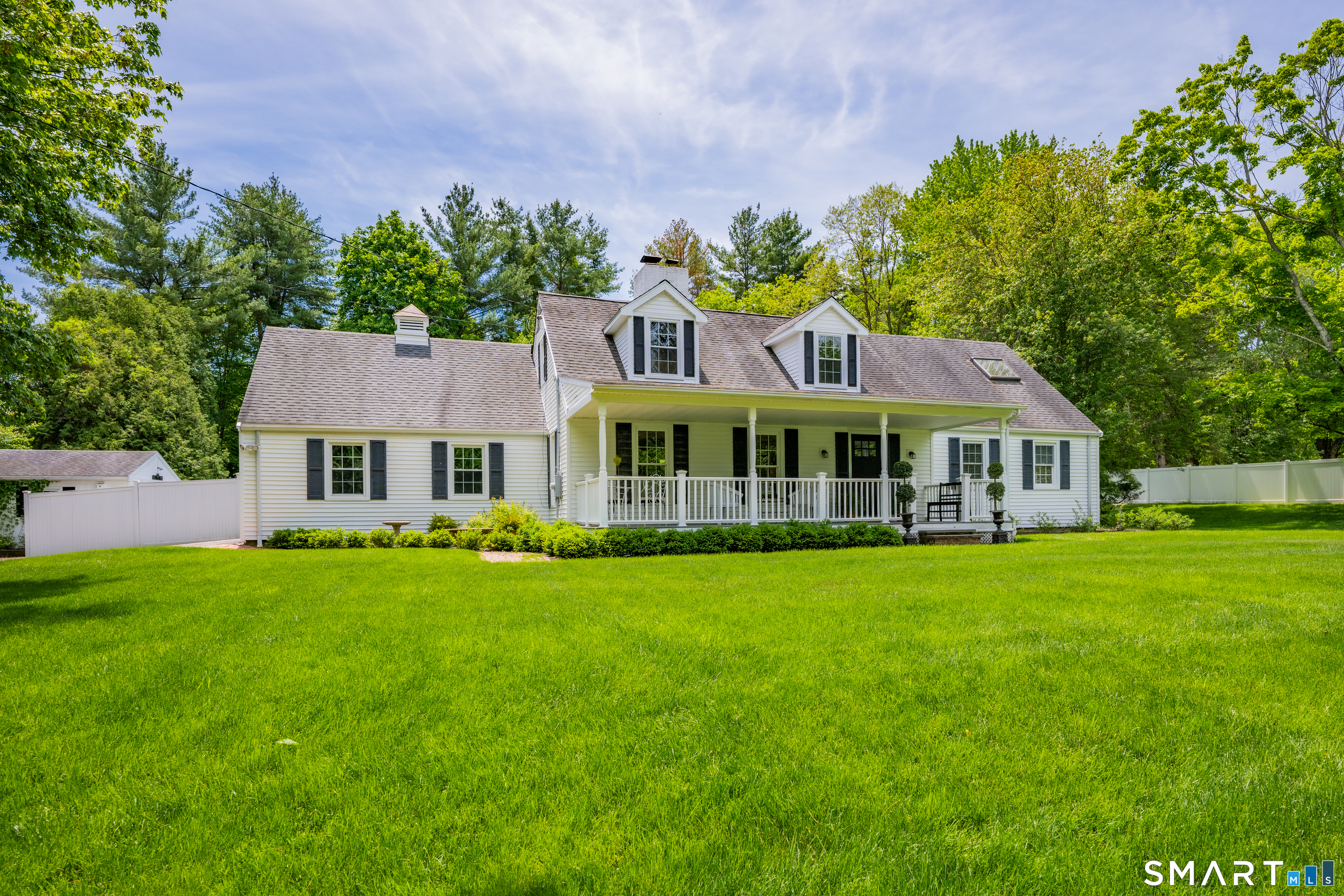 1000 Bassett Road Watertown, CT 06795 - Photo 35 of 35 a front view of a house with a garden