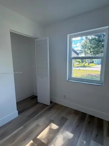 a bathroom with a vanity mirror and sink