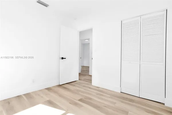 a view of a room with an empty space