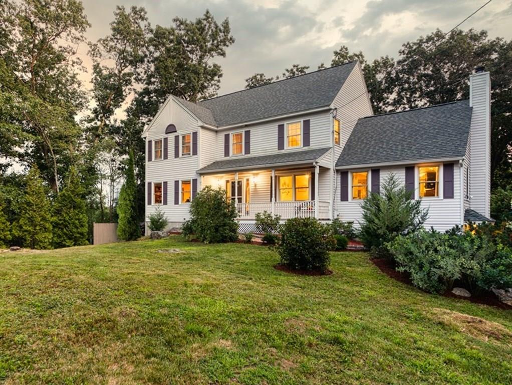 37 Middle Road Newbury, MA 01951 - Photo 1 of 42 a front view of a house with a yard
