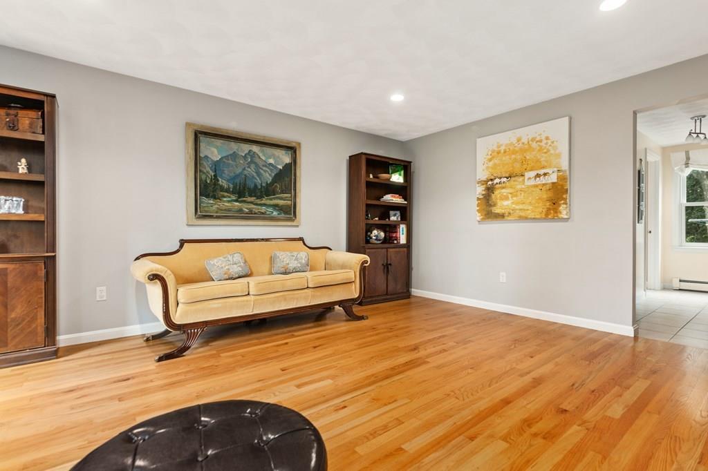 37 Middle Road Newbury, MA 01951 - Photo 12 of 42 a bedroom with a bed and a couch