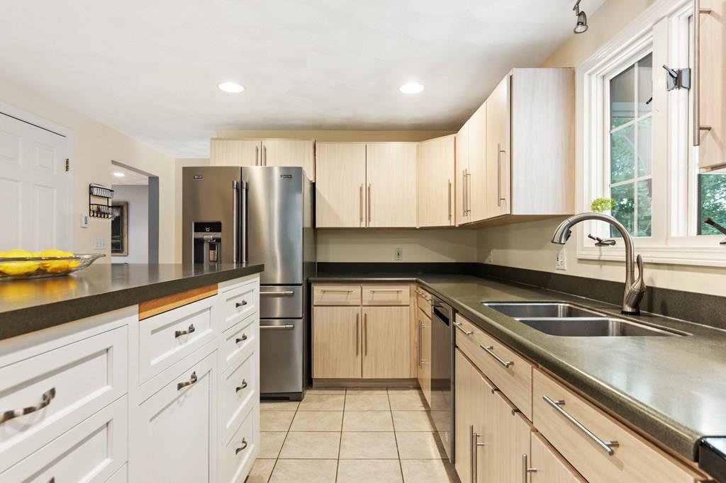 37 Middle Road Newbury, MA 01951 - Photo 14 of 42 a kitchen with granite countertop a sink and cabinets