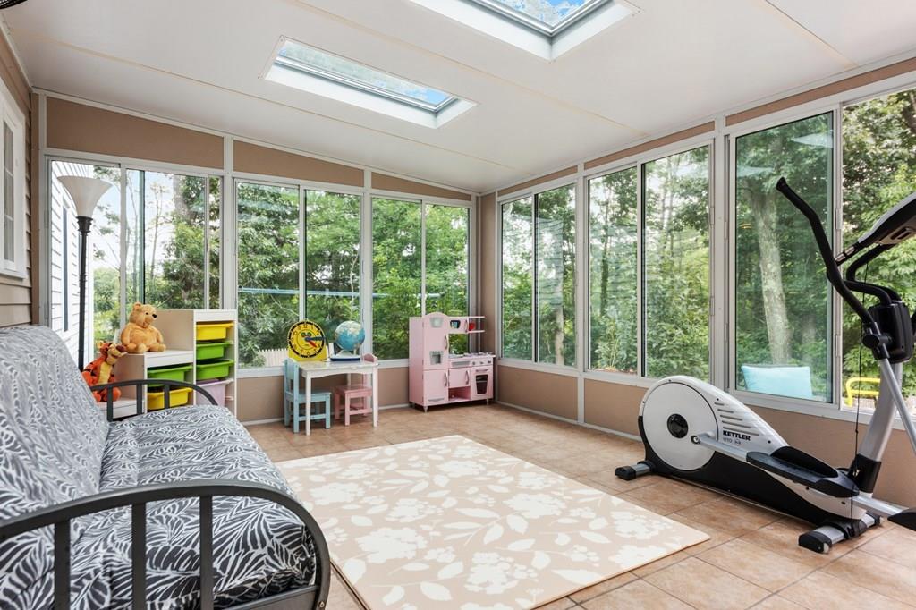37 Middle Road Newbury, MA 01951 - Photo 33 of 42 a living room with furniture and floor to ceiling windows