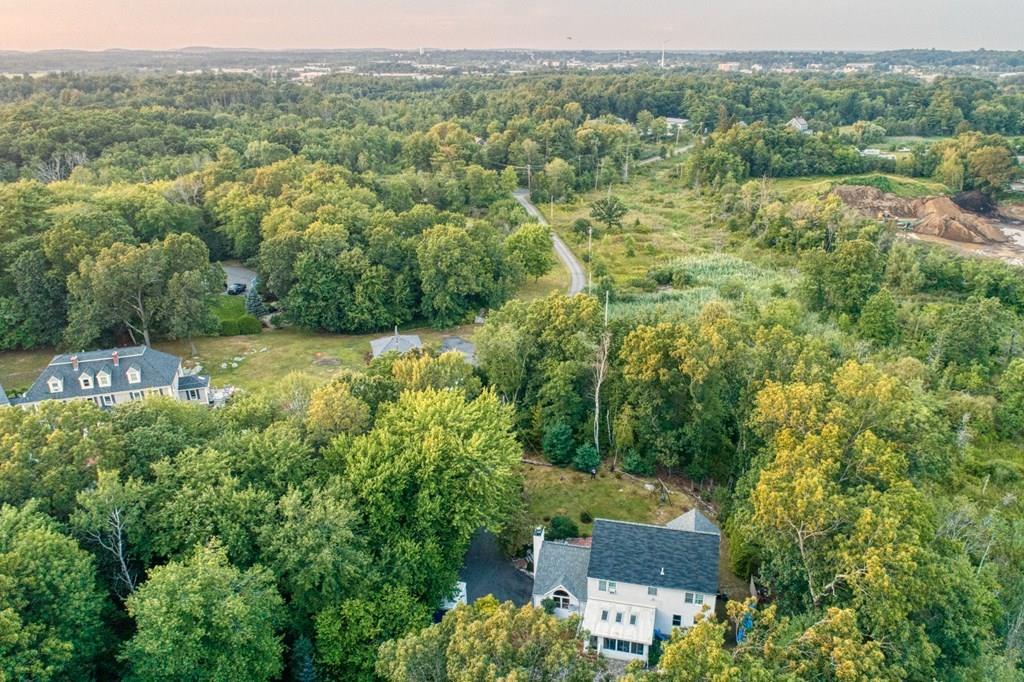 37 Middle Road Newbury, MA 01951 - Photo 39 of 42 an aerial view of a house with a yard
