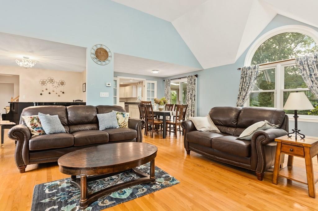 37 Middle Road Newbury, MA 01951 - Photo 4 of 42 a living room with furniture a table and a large window