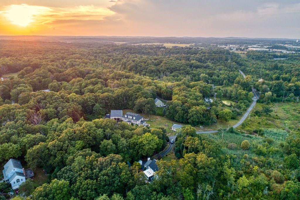 37 Middle Road Newbury, MA 01951 - Photo 41 of 42 an aerial view of residential houses with outdoor space and trees