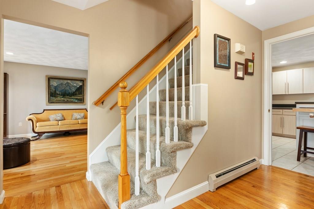 37 Middle Road Newbury, MA 01951 - Photo 9 of 42 a view of entryway and hall with wooden floor