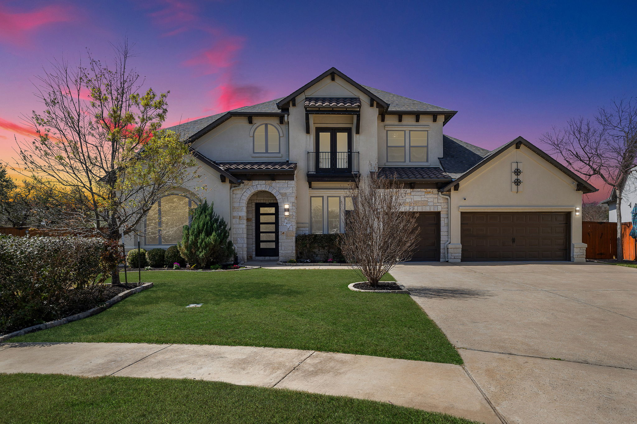 4101 Percheron Bend Cedar Park, TX 78613 - Photo 1 of 1 East facing and overlooking the park with stone siding, a front lawn, driveway, stucco siding, and an attached 3 car garage