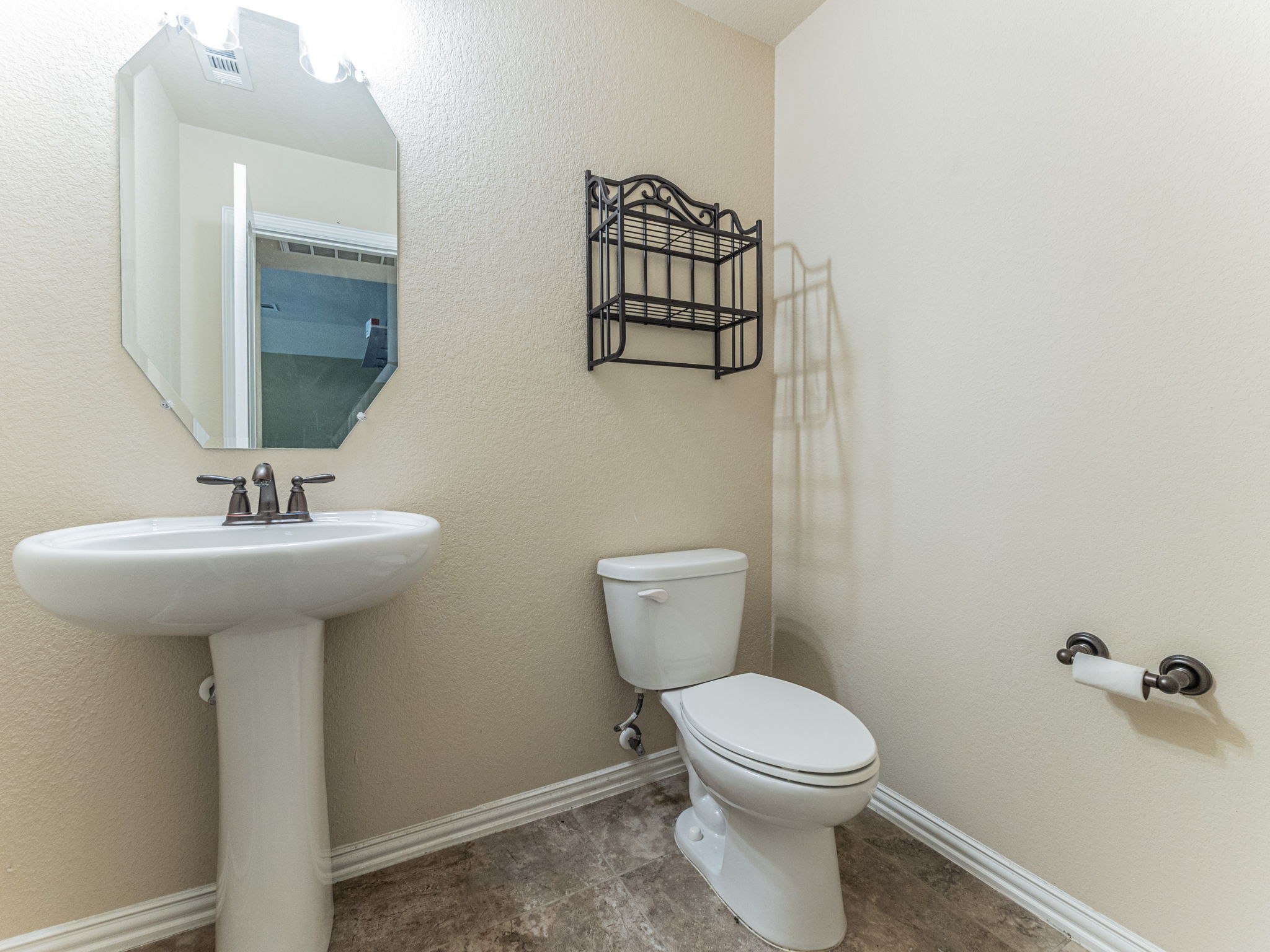 1002 Boxwood Loop Georgetown, TX 78628 - Photo 21 of 25 Bathroom with a textured wall