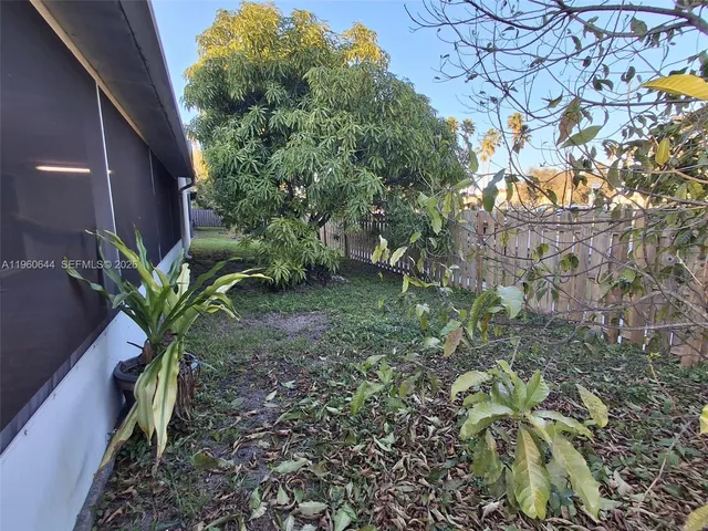 a view of a room with a large window