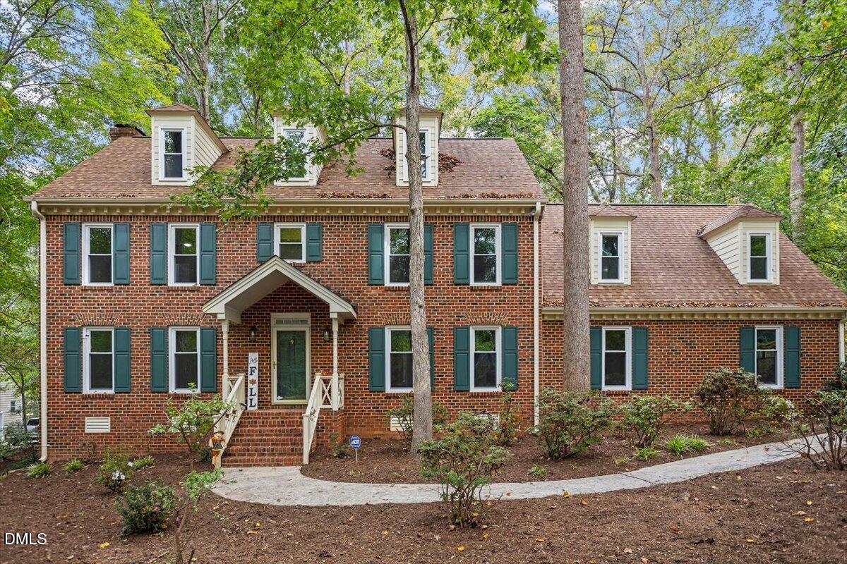 309 Appaloosa Trail Bahama, NC 27503 - Photo 1 of 45 front view of a brick house