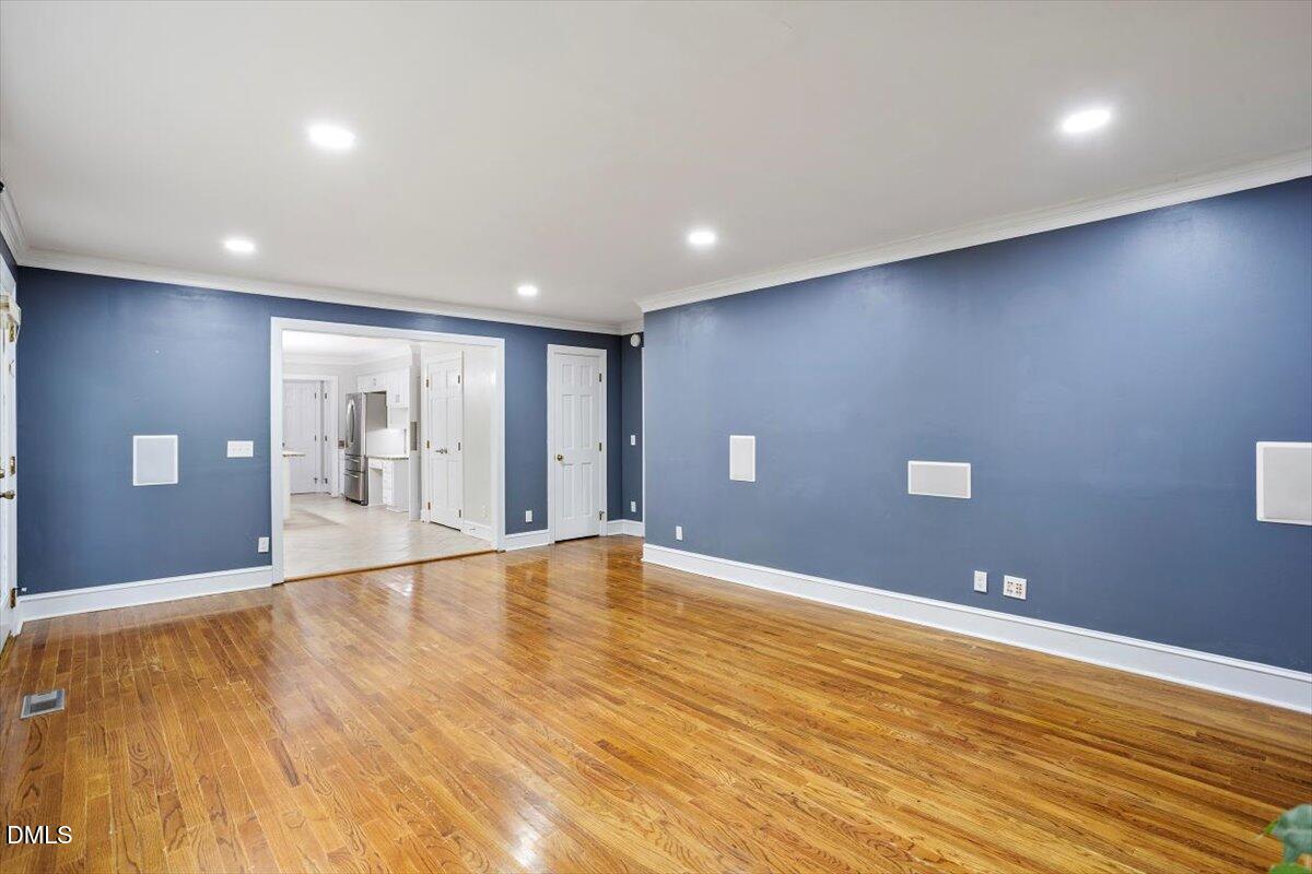 309 Appaloosa Trail Bahama, NC 27503 - Photo 13 of 45 a view of an empty room with wooden floor