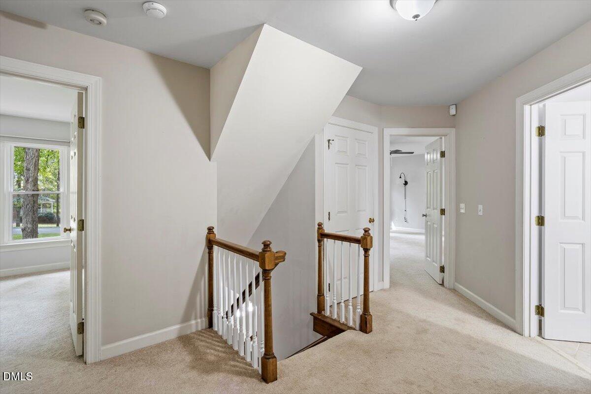 309 Appaloosa Trail Bahama, NC 27503 - Photo 20 of 45 an entryway with a white walls and stairs