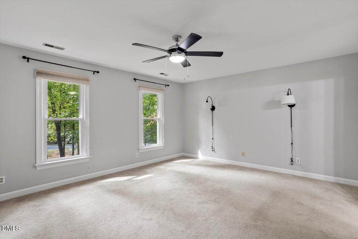 309 Appaloosa Trail Bahama, NC 27503 - Photo 21 of 45 a view of an empty room with a window