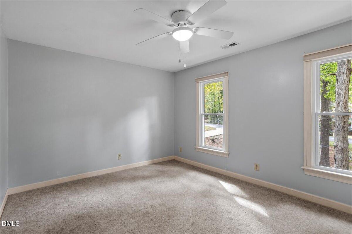 309 Appaloosa Trail Bahama, NC 27503 - Photo 26 of 45 a view of an empty room with a window