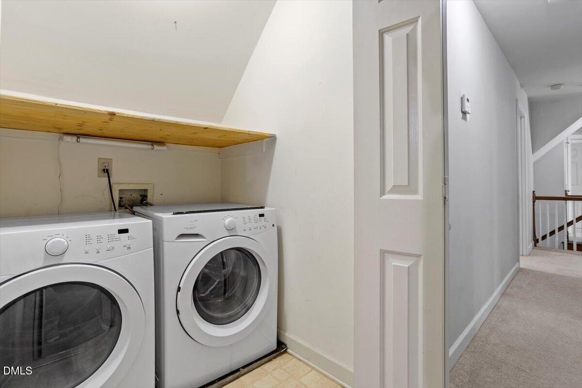 309 Appaloosa Trail Bahama, NC 27503 - Photo 27 of 45 a utility room with dryer and washer