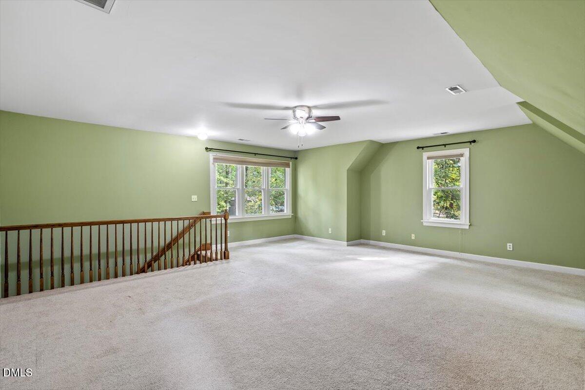 309 Appaloosa Trail Bahama, NC 27503 - Photo 29 of 45 a view of a livingroom with a ceiling fan and window