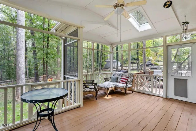 a view of a two chairs on the roof deck