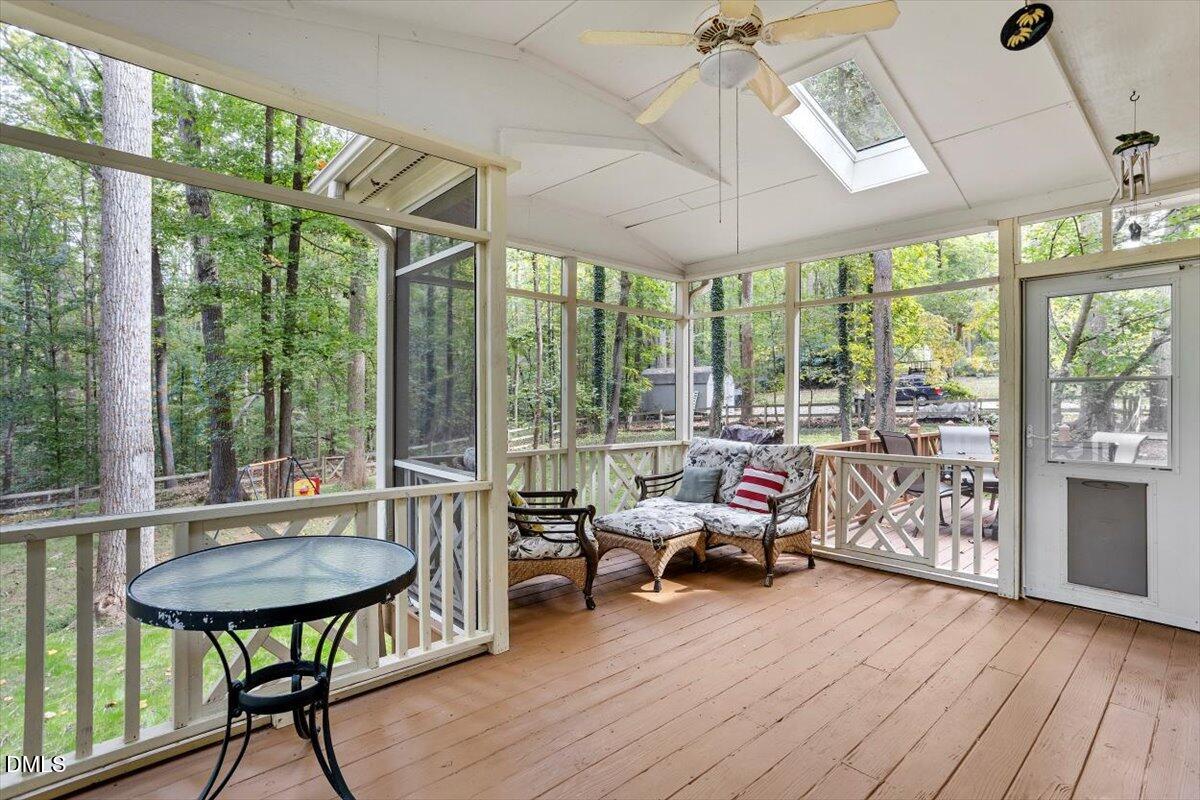 309 Appaloosa Trail Bahama, NC 27503 - Photo 33 of 45 a living room with furniture and a large window