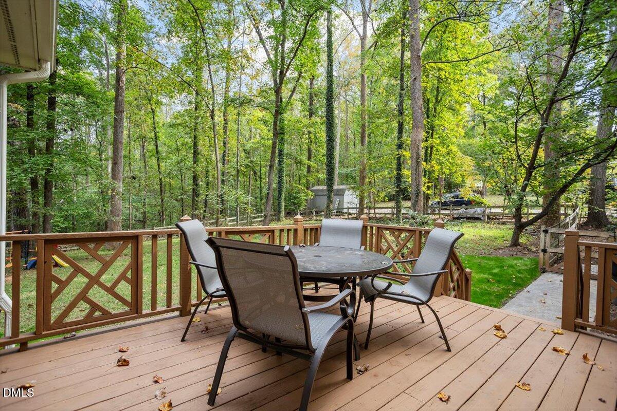 309 Appaloosa Trail Bahama, NC 27503 - Photo 35 of 45 a view of a two chairs on the roof deck