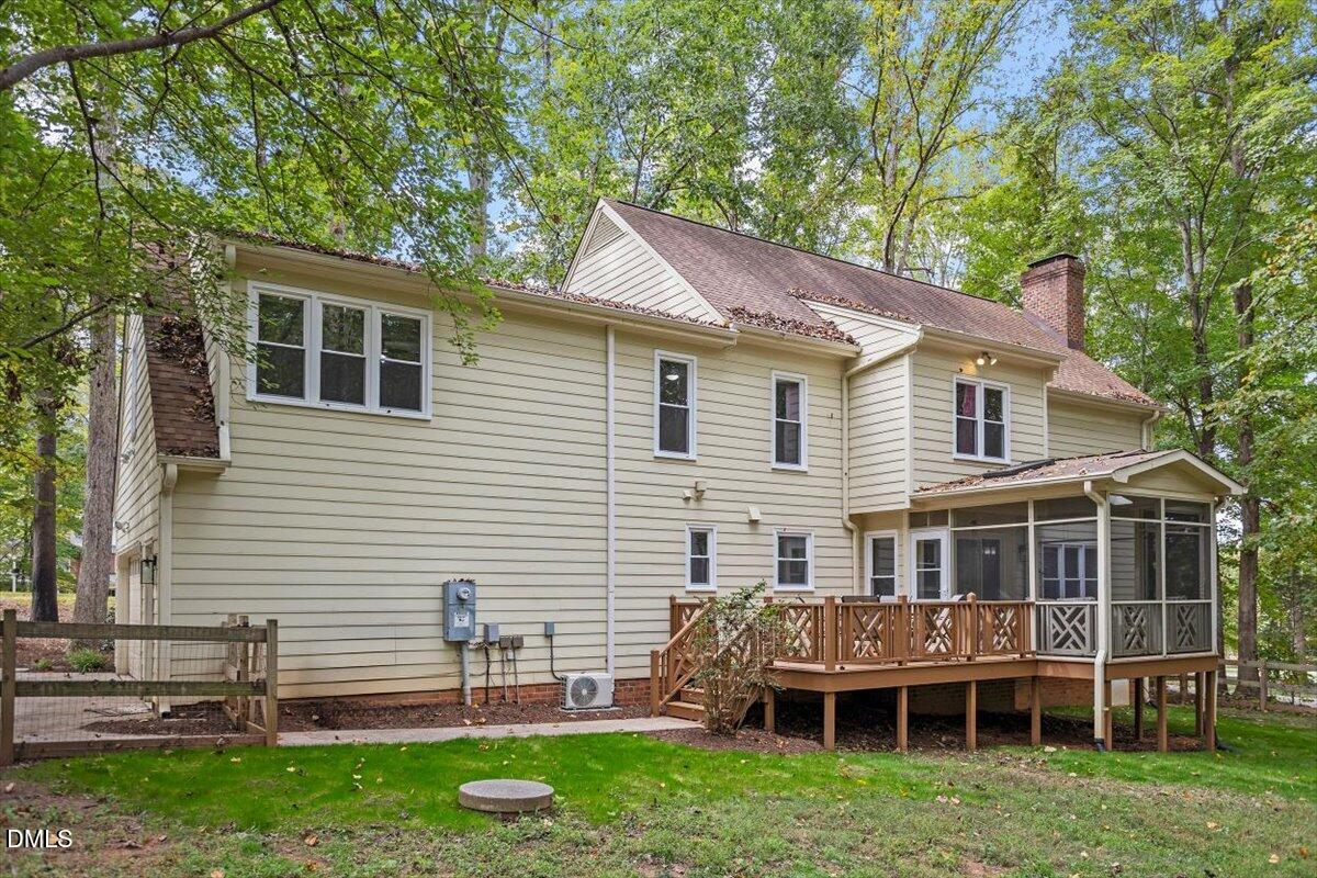 309 Appaloosa Trail Bahama, NC 27503 - Photo 36 of 45 a house view with a garden space