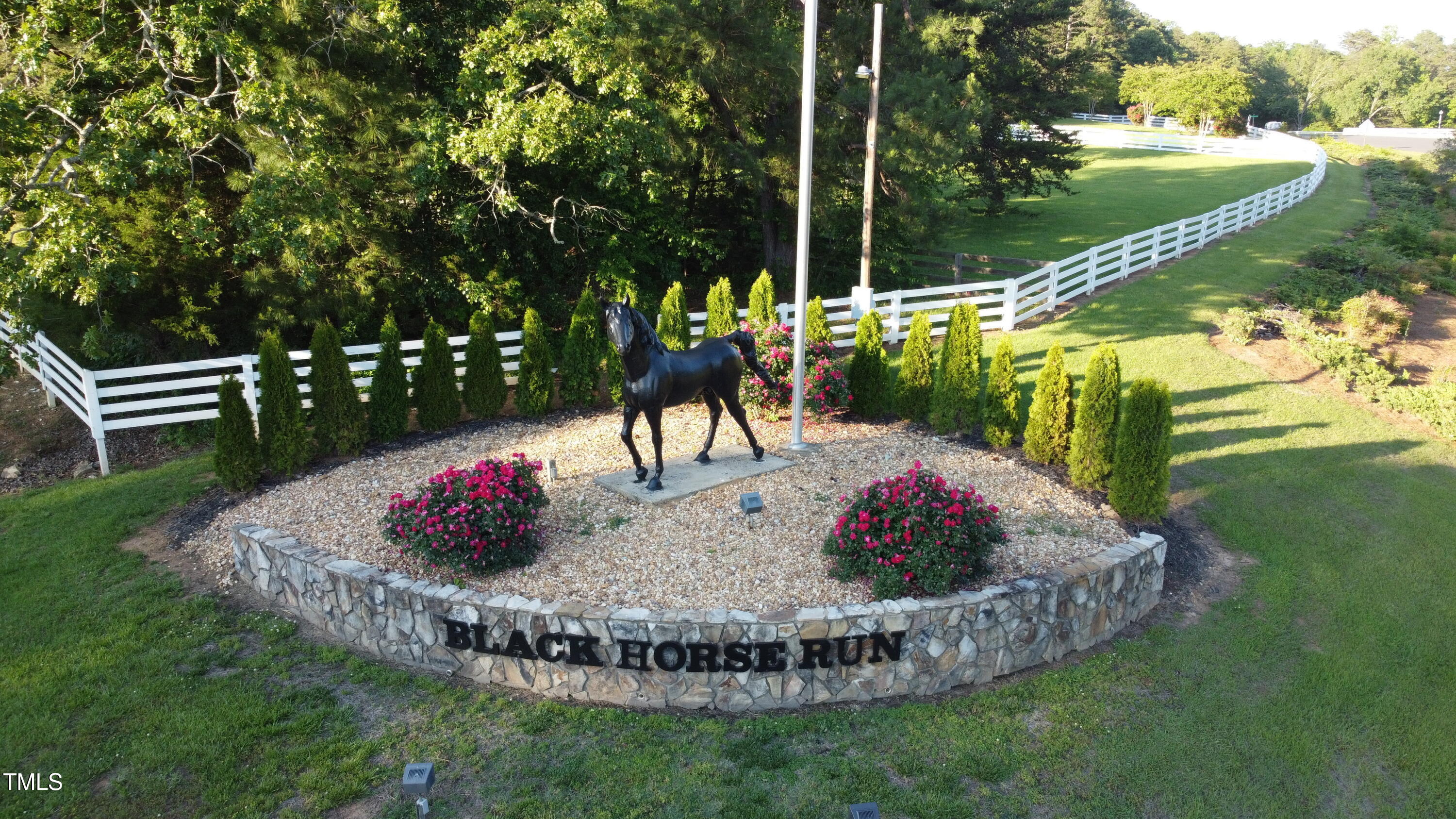 309 Appaloosa Trail Bahama, NC 27503 - Photo 41 of 45 a view of a wooden floor and a yard in the back