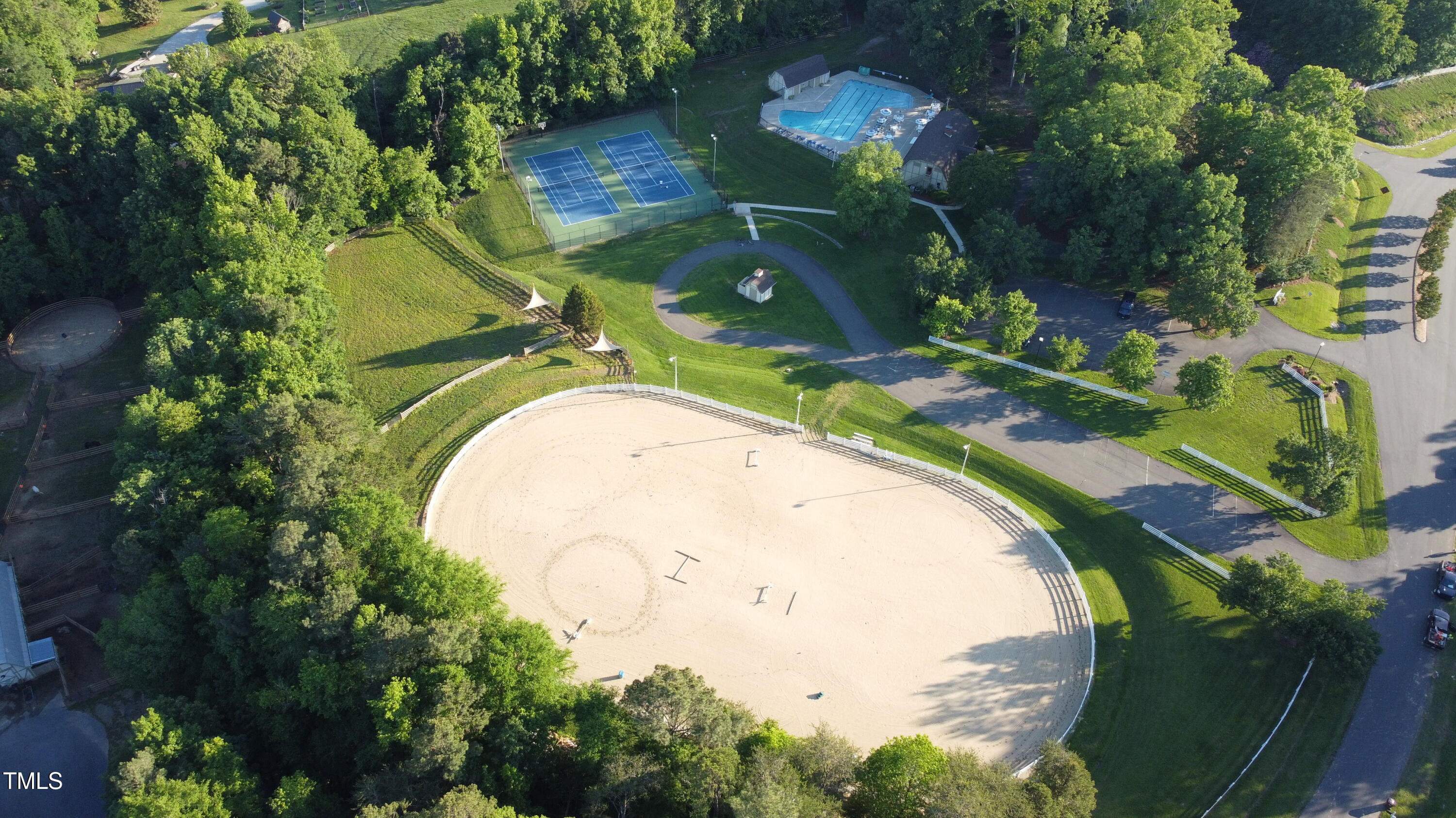 309 Appaloosa Trail Bahama, NC 27503 - Photo 42 of 45 an aerial view of a house with a yard and garden