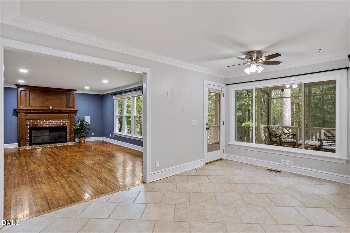 309 Appaloosa Trail Bahama, NC 27503 - Photo 9 of 45 a view of an empty room with a fireplace and window