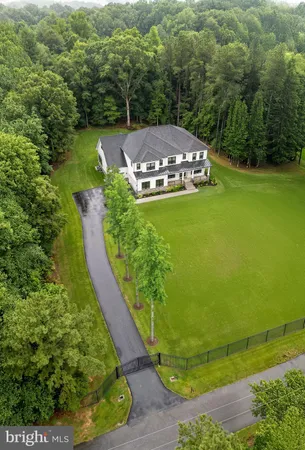 a view of a back yard of a house