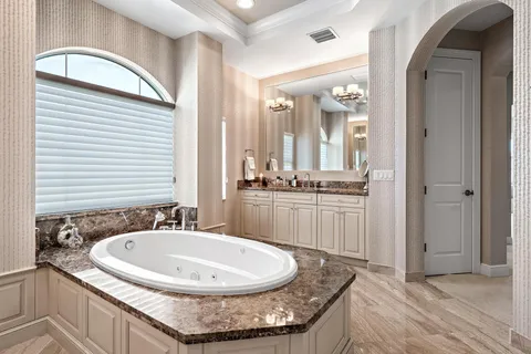 a view of swimming pool from a living room