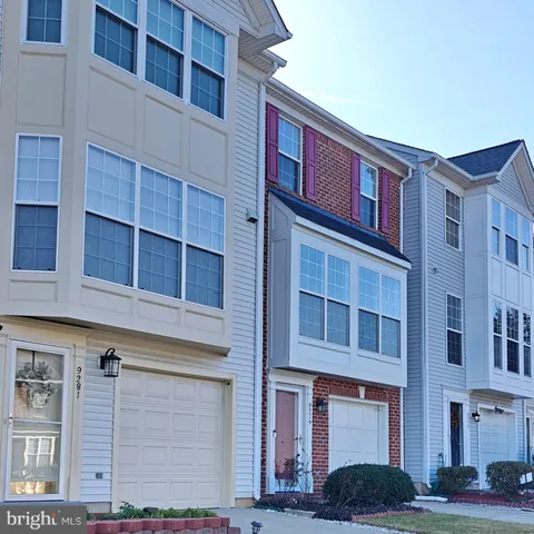 a view of street with houses