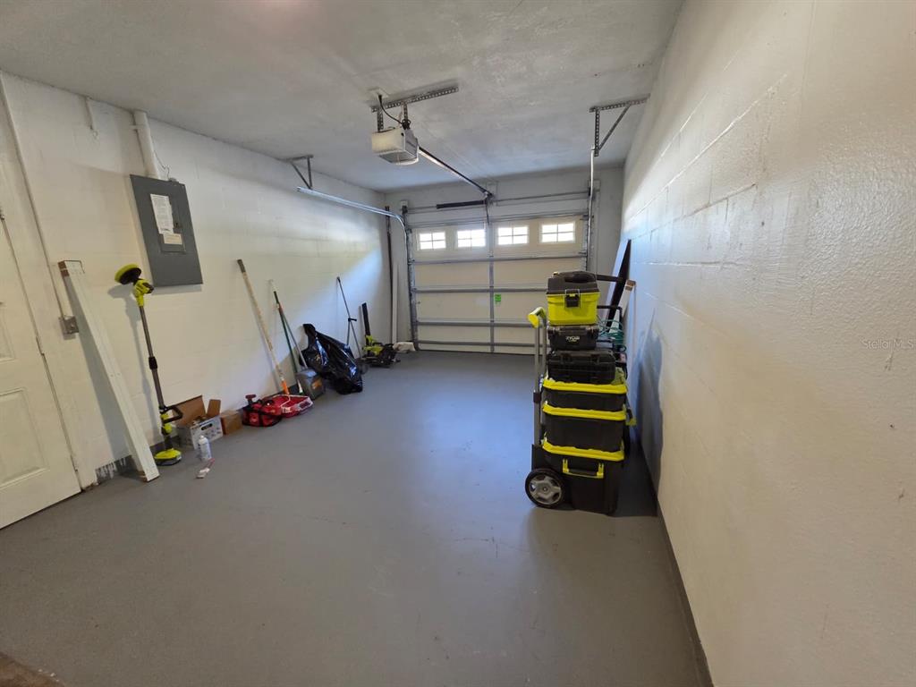 12200 Norvell Road Spring Hill, FL 34609 - Photo 13 of 16 a room with furniture and a window