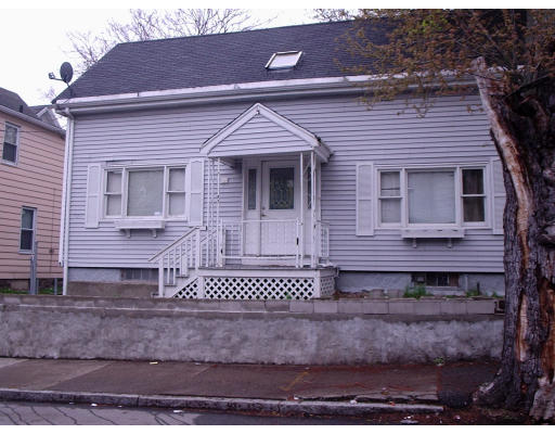 131 Adams Street Lynn, MA 01902 - Photo 1 of 5 a view of a house with a yard