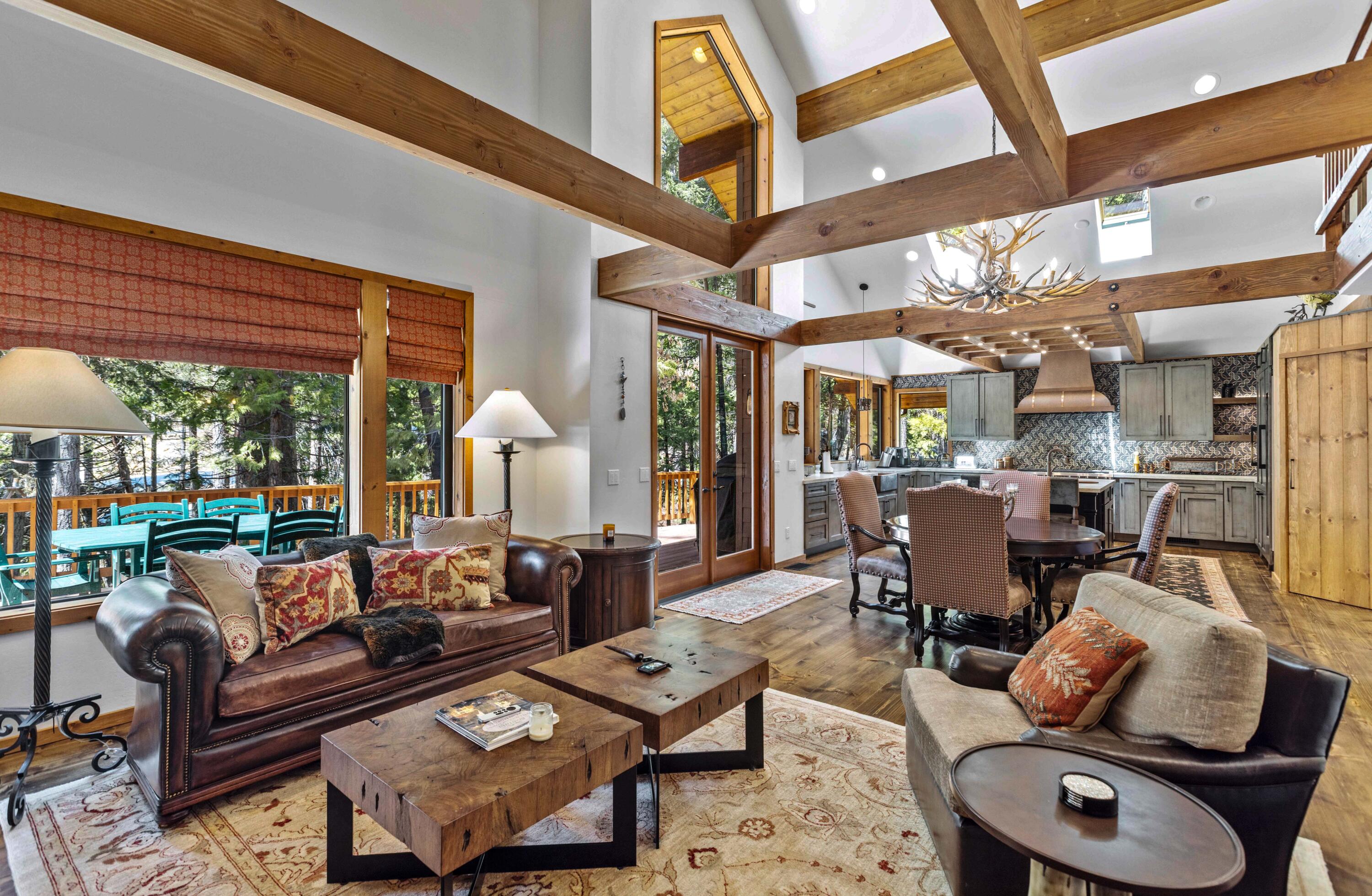 24581 Fern Valley Road Idyllwild, CA 92549 - Photo 11 of 45 a living room with furniture and a large window