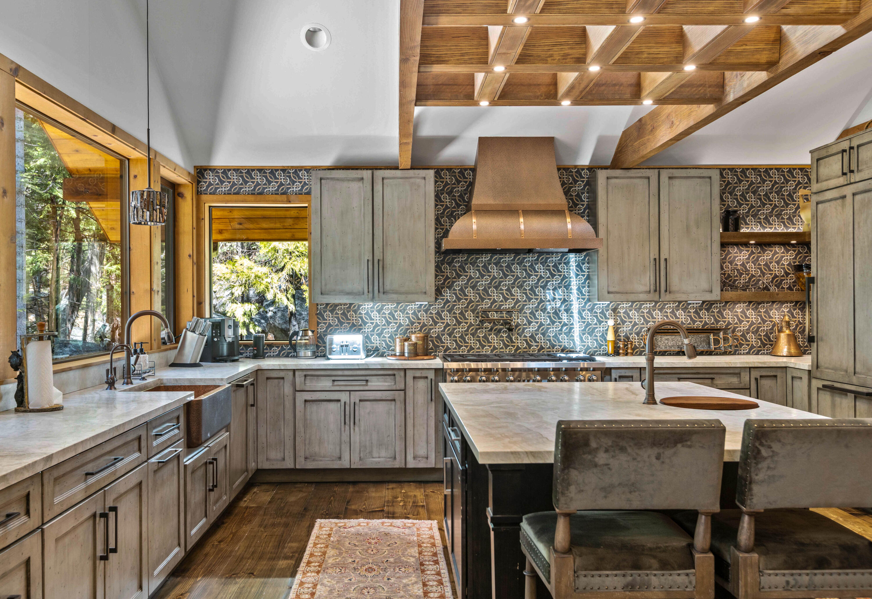 24581 Fern Valley Road Idyllwild, CA 92549 - Photo 14 of 45 a kitchen with a sink and cabinets