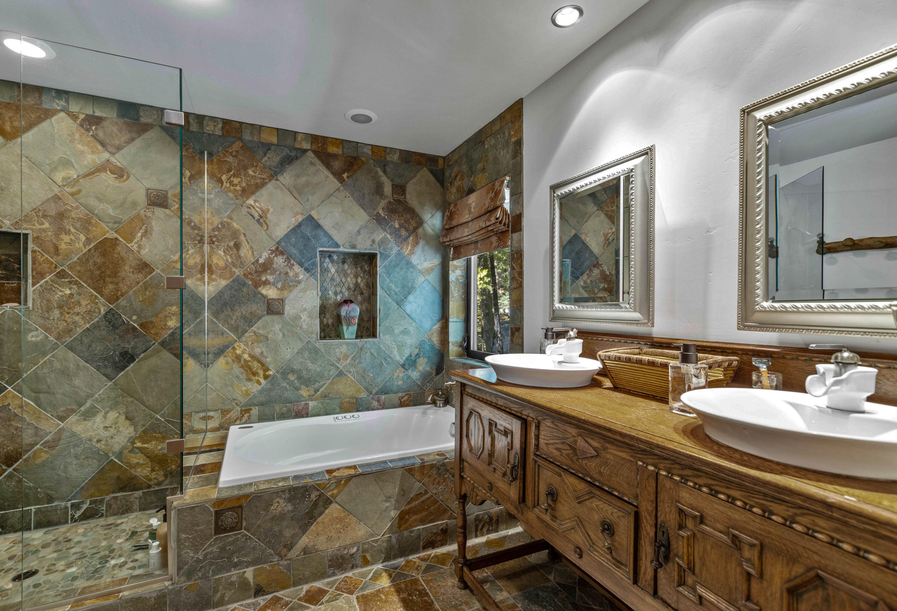 24581 Fern Valley Road Idyllwild, CA 92549 - Photo 21 of 45 a bathroom with double sink and a mirror