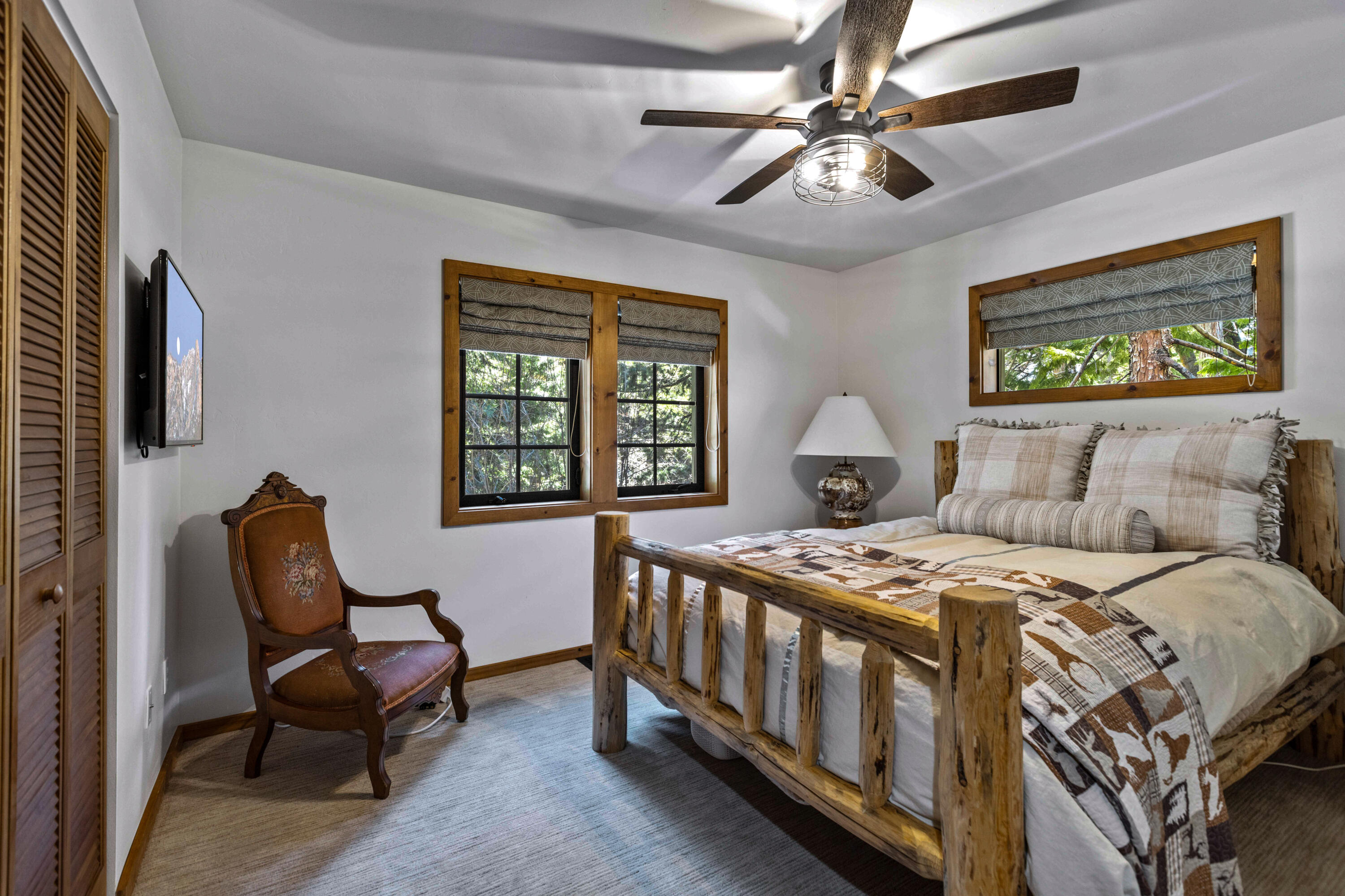 24581 Fern Valley Road Idyllwild, CA 92549 - Photo 23 of 45 a bedroom with a bed and a window