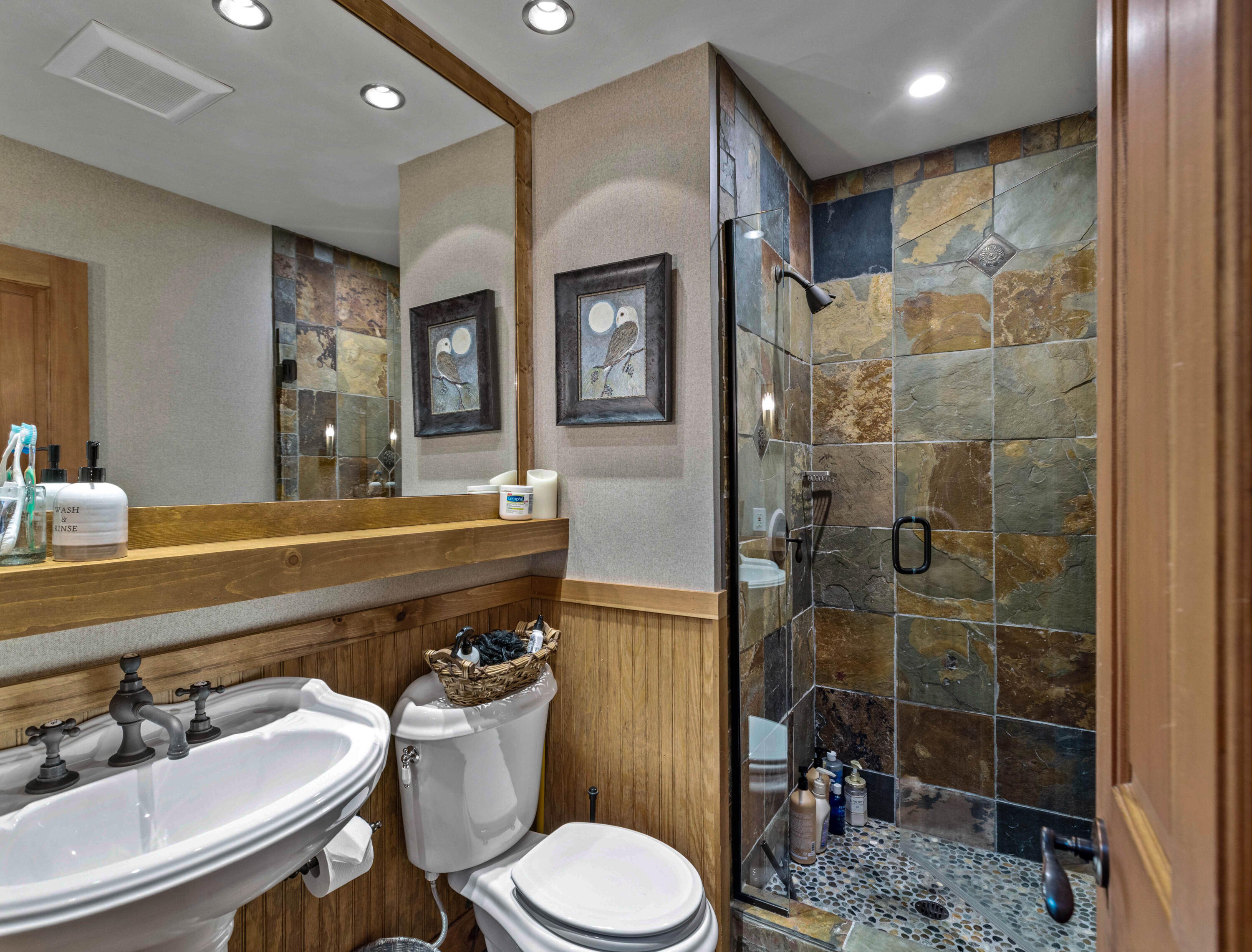 24581 Fern Valley Road Idyllwild, CA 92549 - Photo 24 of 45 a bathroom with a toilet a sink and shower
