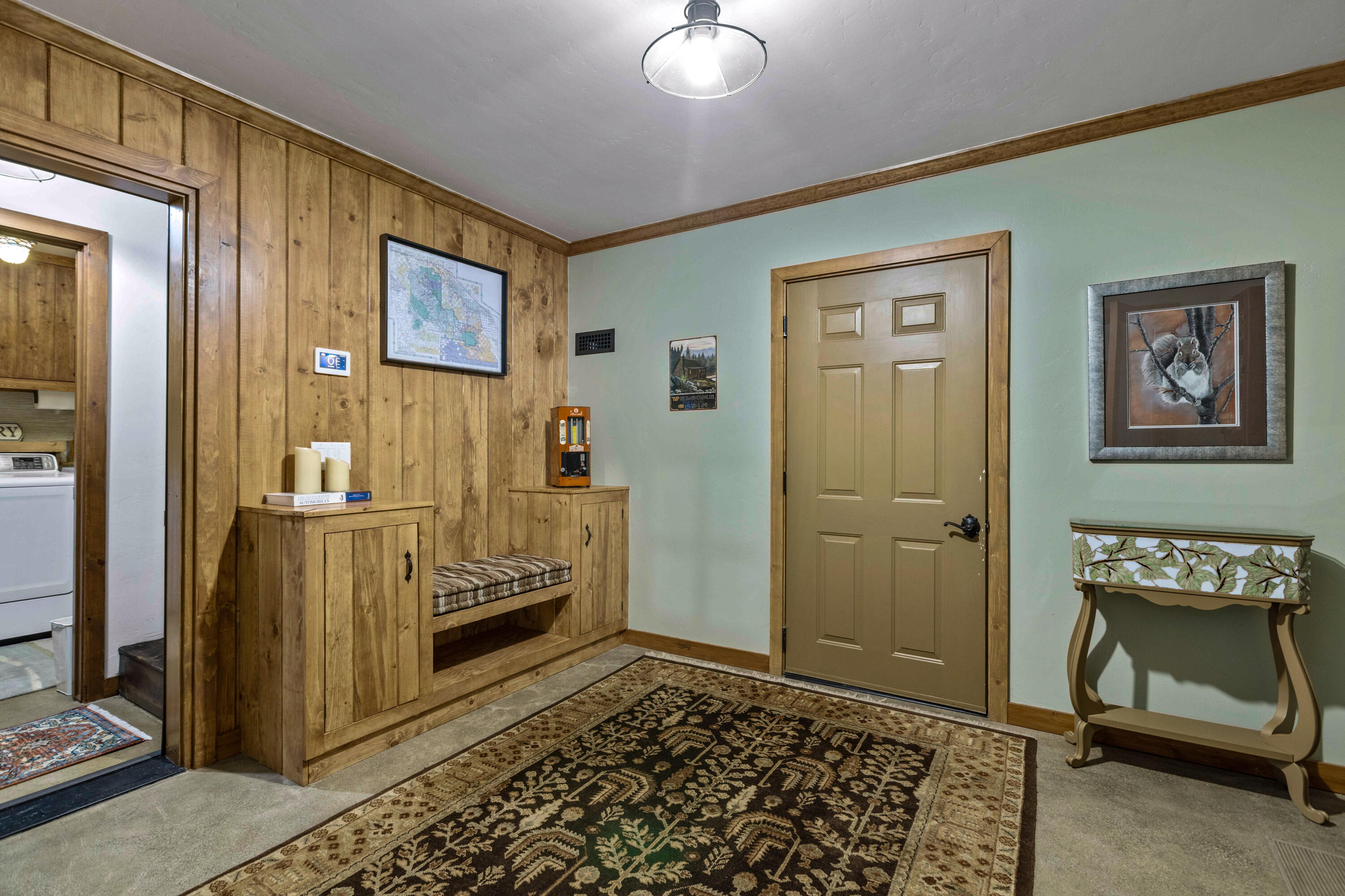 24581 Fern Valley Road Idyllwild, CA 92549 - Photo 32 of 45 a bedroom with a bed and a view of bathroom