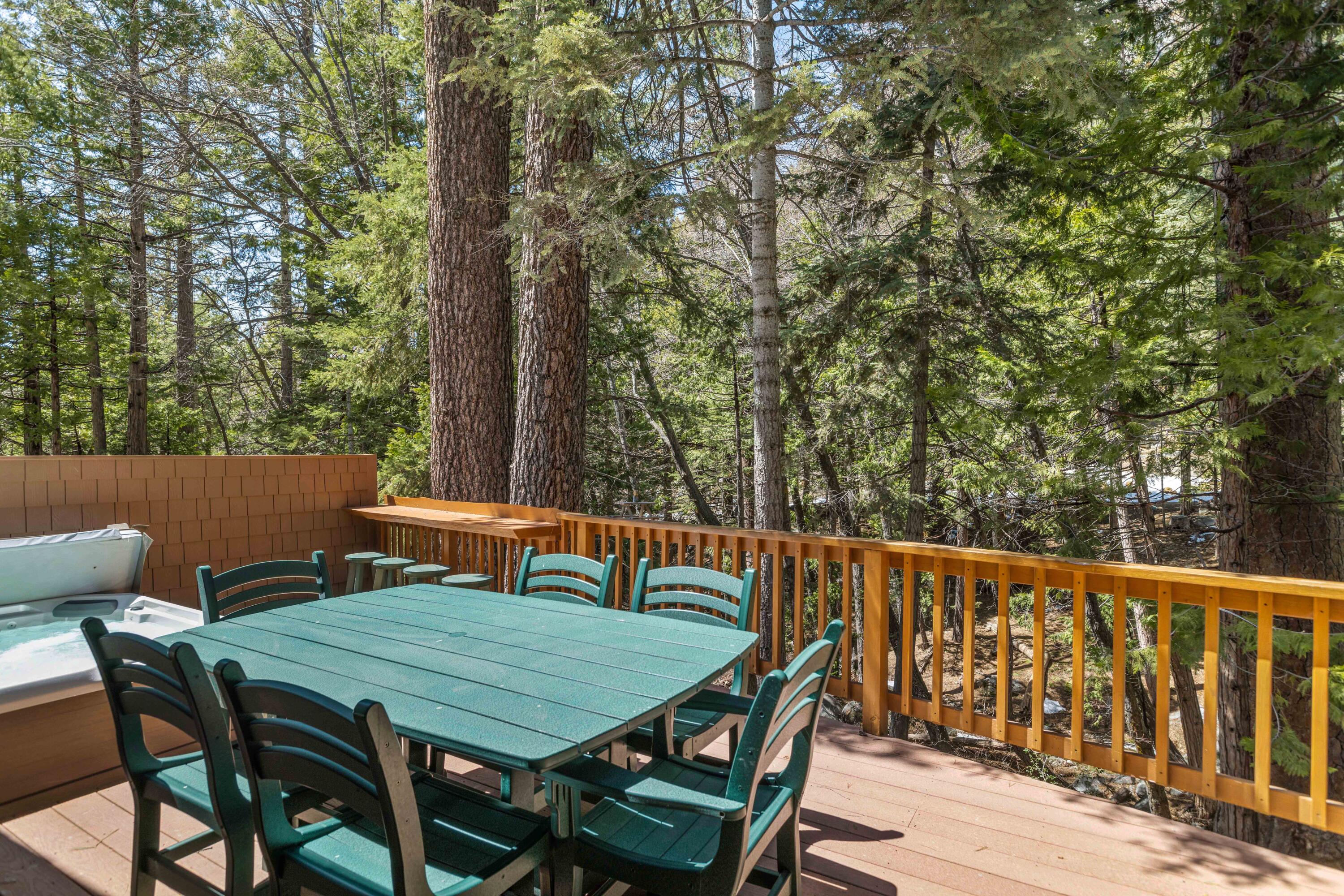 24581 Fern Valley Road Idyllwild, CA 92549 - Photo 38 of 45 a balcony with wooden floor table and chairs