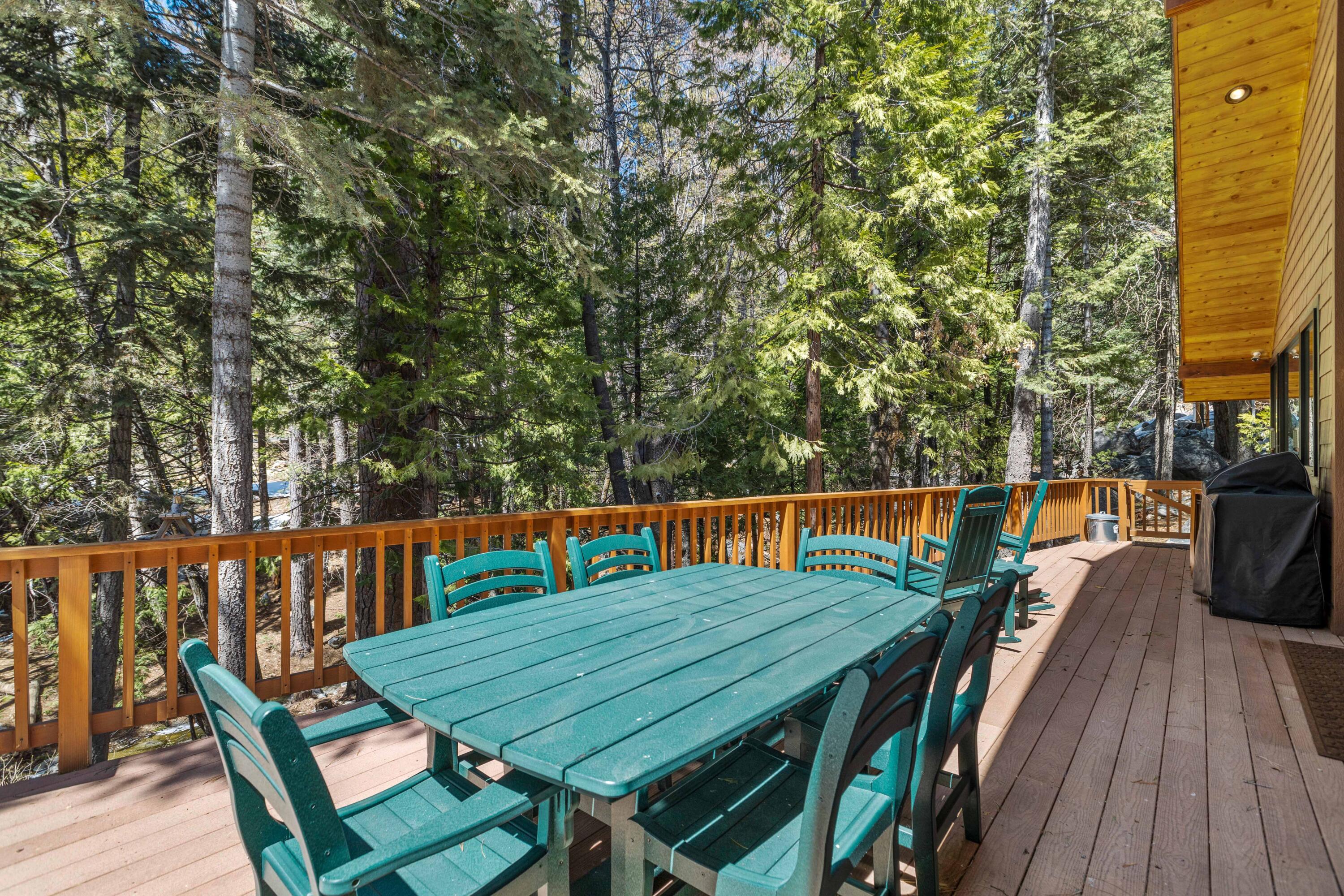 24581 Fern Valley Road Idyllwild, CA 92549 - Photo 39 of 45 a balcony with wooden floor outdoor seating and yard in the back