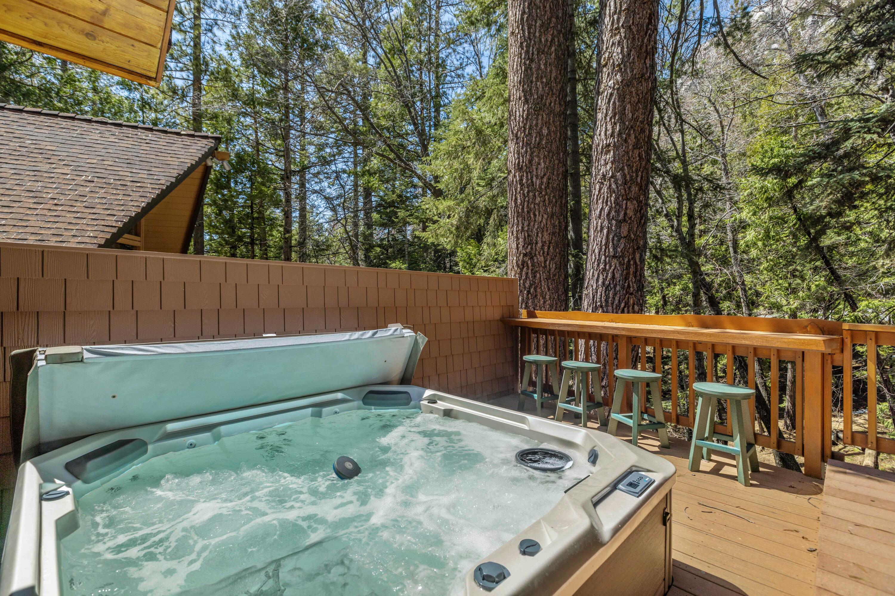 24581 Fern Valley Road Idyllwild, CA 92549 - Photo 40 of 45 a view of roof deck with wooden fence and a couple of chairs