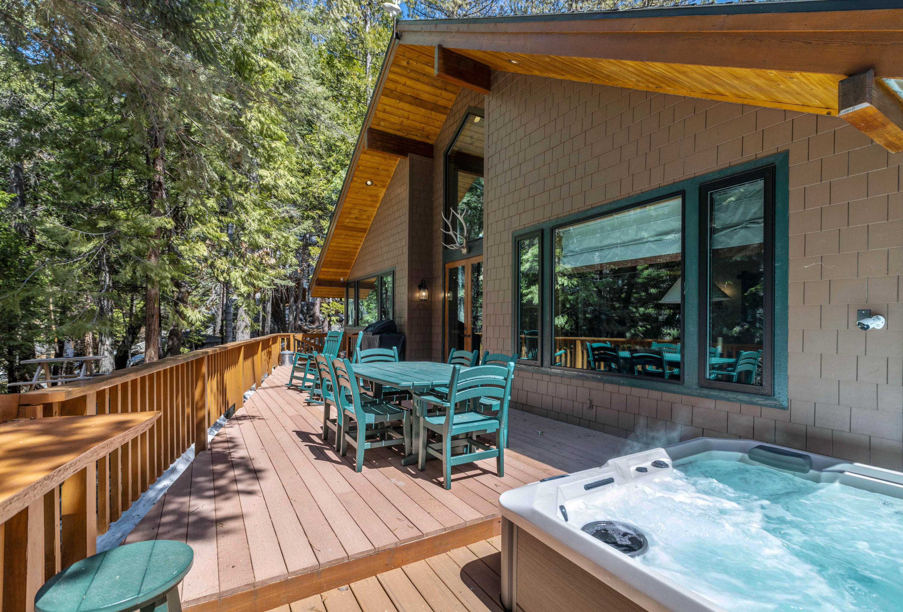 24581 Fern Valley Road Idyllwild, CA 92549 - Photo 41 of 45 a balcony with furniture and a potted plant