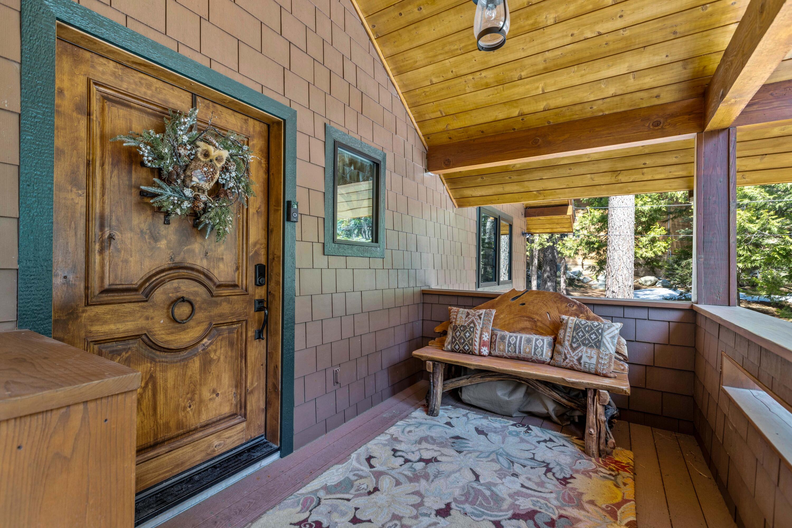 24581 Fern Valley Road Idyllwild, CA 92549 - Photo 5 of 45 a living room with a couch and a table
