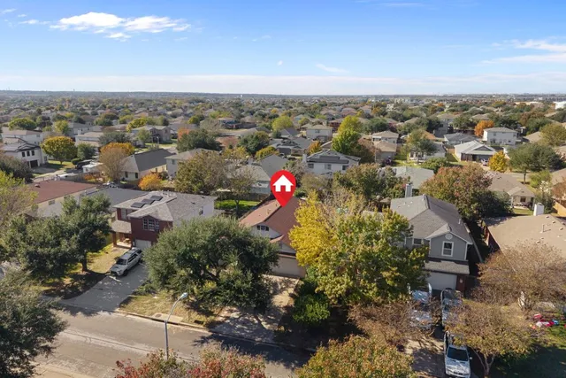 a view of a swimming pool with seating area