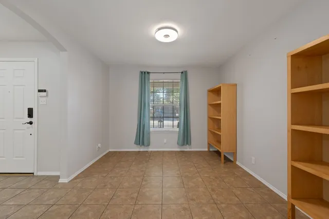 a view of an empty room with window