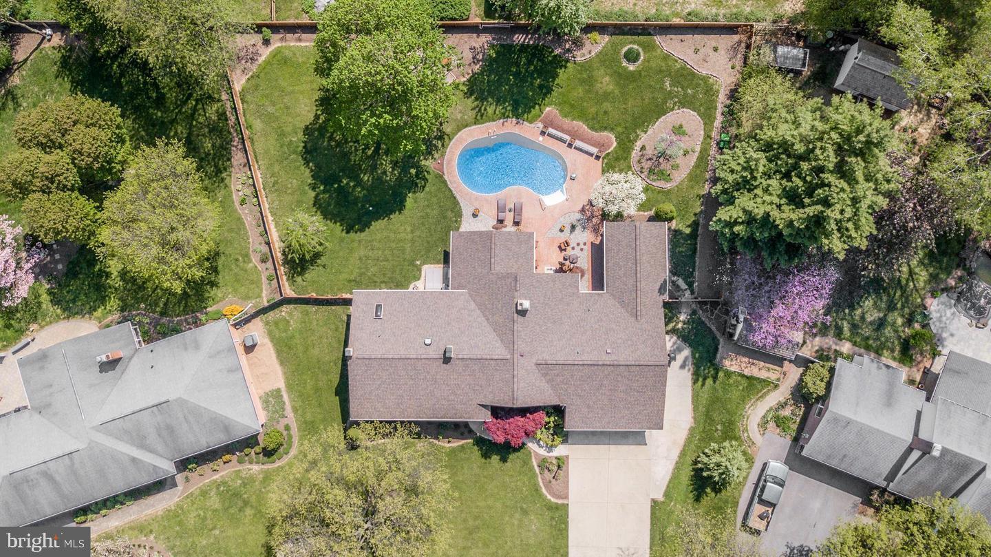 8104 Overlook Court Frederick, MD 21702 - Photo 2 of 12 an aerial view of a house with a swimming pool and outdoor seating