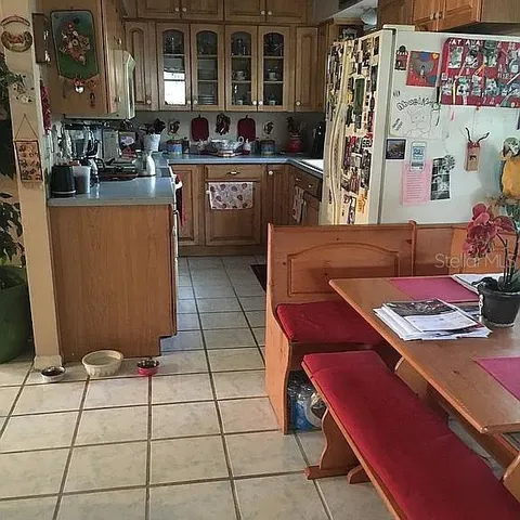 a bedroom with a bed and dresser