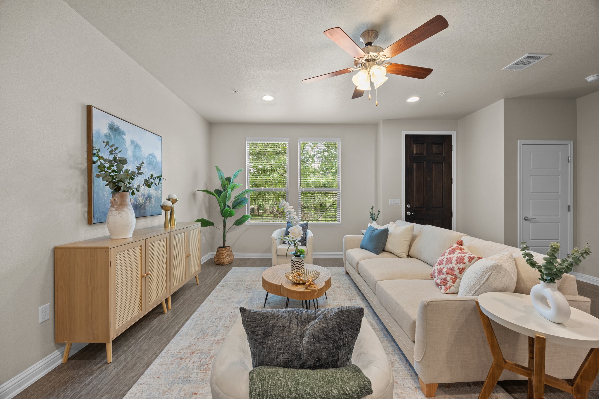 a living room with furniture and window